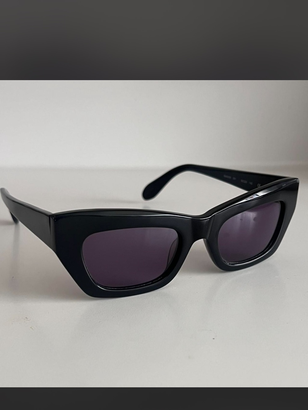 BCBGMaxAzria Black Frame Sunglasses with Dark Purple Lenses - Picture 2 of 7